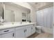 Well-maintained bathroom with a single vanity, a large mirror, and a shower/tub combo at 5830 E Mckellips Rd # 101, Mesa, AZ 85215