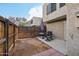 Enclosed backyard area featuring a patio with outdoor seating, ideal for enjoying the outdoor space at 5923 W Townley Ave, Glendale, AZ 85302