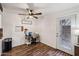 View of the kitchen area with a work desk, and door access to outside at 5923 W Townley Ave, Glendale, AZ 85302