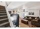 Spacious living area with stairway, new flooring, and lots of natural light at 5923 W Townley Ave, Glendale, AZ 85302