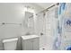 Bathroom with a modern sink, a mosaic backsplash, and a shower with blue patterned curtains at 6814 N 14Th St, Phoenix, AZ 85014