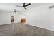 Spacious living room with sleek flooring, modern ceiling fans and ample natural light at 6814 N 14Th St, Phoenix, AZ 85014