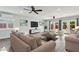 Inviting living area with neutral colors, recessed lighting, access to the backyard, and an entertainment center at 6814 N 14Th St, Phoenix, AZ 85014