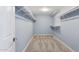 Walk-in closet with custom shelving for optimal storage and organization at 6814 N 14Th St, Phoenix, AZ 85014
