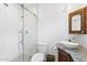 Bathroom featuring a glass shower, toilet, and granite countertop at 710 E Hayward Ave, Phoenix, AZ 85020