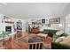 Elegant living room with hardwood floors, a fireplace, and stylish decor throughout at 710 E Hayward Ave, Phoenix, AZ 85020