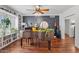 Cozy music room with a grand piano, dark accent wall, and custom built-in shelving at 710 E Hayward Ave, Phoenix, AZ 85020