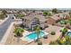 Aerial view of a home featuring a pool, patio, and landscaped backyard, perfect for outdoor living at 7472 E Black Rock Rd, Scottsdale, AZ 85255