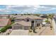 Aerial view of the home highlighting its desert landscaping and proximity to other homes at 7472 E Black Rock Rd, Scottsdale, AZ 85255
