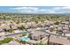 Beautiful aerial view of a neighborhood featuring a home with a private pool and desert landscaping at 7472 E Black Rock Rd, Scottsdale, AZ 85255
