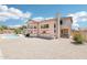 Expansive backyard features a pool, desert landscaping, and a spacious outdoor area at 7472 E Black Rock Rd, Scottsdale, AZ 85255