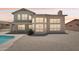 Spacious backyard featuring a pool, patio area, and ample space for outdoor entertaining at 7472 E Black Rock Rd, Scottsdale, AZ 85255