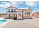 Expansive backyard features a pool, desert landscaping, and a spacious outdoor area at 7472 E Black Rock Rd, Scottsdale, AZ 85255