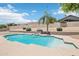 Beautiful pool area with a well-maintained pool and surrounding landscaped yard at 7472 E Black Rock Rd, Scottsdale, AZ 85255
