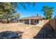 Spacious backyard with a covered patio, ready for outdoor entertaining and relaxation at 8227 E Heatherbrae Dr, Scottsdale, AZ 85251