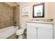 This bathroom has updated vanity with granite counter and updated shower with neutral walls at 8227 E Heatherbrae Dr, Scottsdale, AZ 85251