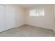 Spare bedroom featuring tile flooring and a closet for extra storage at 8227 E Heatherbrae Dr, Scottsdale, AZ 85251
