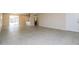 Spacious living room with tile floors that flows to the adjacent kitchen at 8227 E Heatherbrae Dr, Scottsdale, AZ 85251