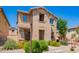 Charming two-story home with well-maintained landscaping, stone yard, and a welcoming walkway at 9148 W Meadow Dr, Peoria, AZ 85382