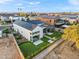 Aerial view of modern home featuring a putting green and an outdoor seating area at 1013 W Ardmore Rd, Phoenix, AZ 85041