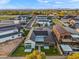 New construction home featuring dark metal roof, putting green, and open layout with patio at 1013 W Ardmore Rd, Phoenix, AZ 85041