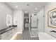 Luxurious bathroom with walk-in shower, modern vanity, and designer tile flooring at 1013 W Ardmore Rd, Phoenix, AZ 85041