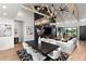 Open-concept living space with high ceilings, fireplace, and seamless indoor-outdoor flow at 1013 W Ardmore Rd, Phoenix, AZ 85041