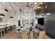 Open-concept living room featuring high ceilings, wooden beams, and an expansive layout at 1013 W Ardmore Rd, Phoenix, AZ 85041