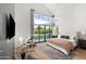 Serene main bedroom with large windows offering views of the backyard at 1013 W Ardmore Rd, Phoenix, AZ 85041