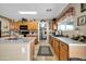Spacious kitchen boasts ample counter space, cabinets, walk-in pantry, and a large center island at 10541 W Foothill Dr, Peoria, AZ 85383