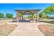 Community pavilion with tables and seating, surrounded by green landscaping at 10541 W Foothill Dr, Peoria, AZ 85383
