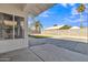 A beautiful backyard showcasing palm trees, and blue sky at 1071 N Danyell Dr, Chandler, AZ 85225