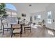 Bright dining room boasts an arched window, natural light, and modern decor at 1071 N Danyell Dr, Chandler, AZ 85225