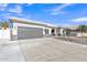 Spacious driveway leading to a two-car garage on a charming single-story home at 1071 N Danyell Dr, Chandler, AZ 85225