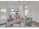 Open concept living room and kitchen with modern furnishings and ample natural light at 1071 N Danyell Dr, Chandler, AZ 85225