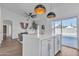 Bright and open kitchen island with a view into the stylish living area at 1071 N Danyell Dr, Chandler, AZ 85225
