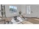 Bright sitting area features wood floors, natural light, and modern decor at 1071 N Danyell Dr, Chandler, AZ 85225