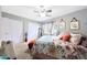 A light and bright bedroom offers a cozy atmosphere, closet and a window for natural light at 11207 W Turney Ave, Phoenix, AZ 85037