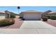 Charming single-story home with desert landscaping and a two-car garage at 11207 W Turney Ave, Phoenix, AZ 85037