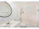 White bathroom featuring a vanity, toilet, and shower-tub combination at 11836 W Rosewood Dr, El Mirage, AZ 85335