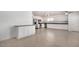 Open-concept kitchen with ample counter space, stainless steel appliances, and plenty of cabinet storage at 11836 W Rosewood Dr, El Mirage, AZ 85335
