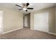 Bedroom featuring a ceiling fan and a large closet for ample storage at 13439 W Desert Ln, Surprise, AZ 85374