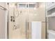 Clean bathroom featuring a glass shower with bench seating at 13824 N 148Th Ln, Surprise, AZ 85379