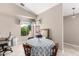 Dining area with round table, tile flooring and natural light at 13824 N 148Th Ln, Surprise, AZ 85379