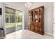 Dining area featuring hutch, tile flooring and sliding glass doors at 13824 N 148Th Ln, Surprise, AZ 85379