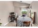 Dining area featuring round table, work space, tile flooring and natural light at 13824 N 148Th Ln, Surprise, AZ 85379