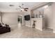 Bright living room featuring tile flooring, ceiling fan, and open floor plan at 13824 N 148Th Ln, Surprise, AZ 85379