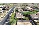 An aerial view of a neighborhood showcasing the house with a nice backyard and desert landscape at 1526 E Hazel Dr, Phoenix, AZ 85042