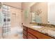 Well-lit bathroom with granite countertop and updated vanity at 1526 E Hazel Dr, Phoenix, AZ 85042
