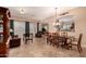 Spacious dining area offering abundant natural light and seamless transition to the living spaces at 1526 E Hazel Dr, Phoenix, AZ 85042